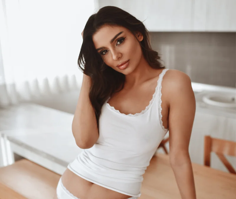 Woman in white top and underwear